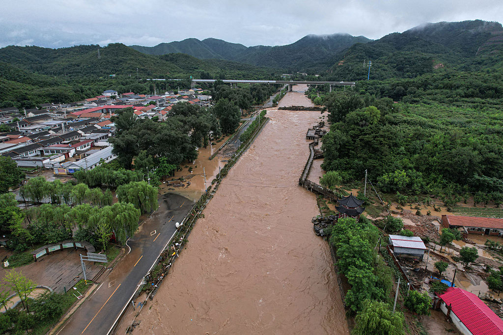 heavy-floods-across-northern-china-kill-at-least-30;-thousands-evacuated-amid-record-rainfall