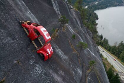 portion-of-park-closed-as-volkswagen-shell-hangs-on-rock-face-in-squamish,-bc