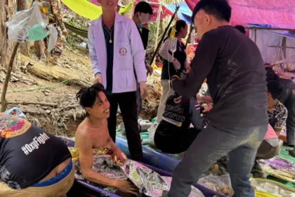 rescuers-free-4-men-who-had-been-trapped-in-a-flooded-laos-cave,-search-for-2-still-missing