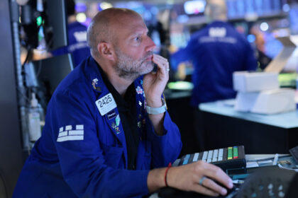 wall-street-review:-dow-hits-new-record-amid-ongoing-market-rotation