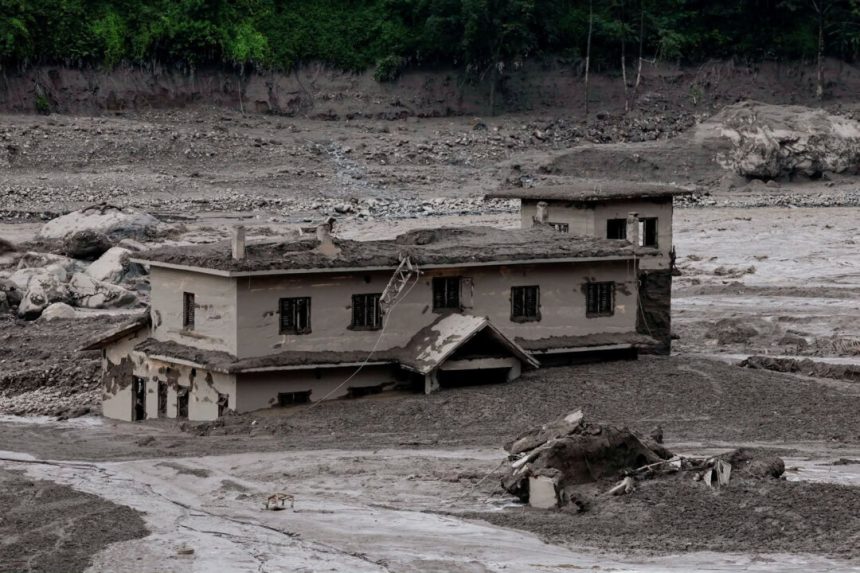 survivors-describe-race-to-escape-nepal–tibet-flood-as-families-search-for-missing