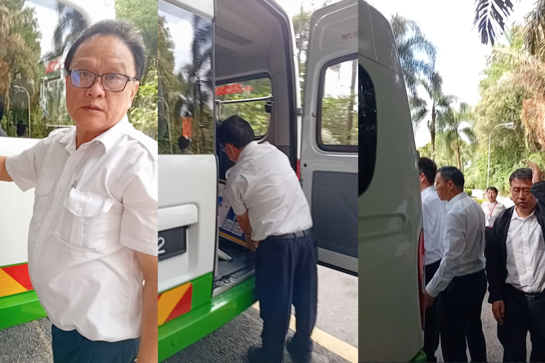 individuals-claiming-to-be-chinese-police-steal-from-falun-gong-booth-in-malaysia,-video-shows